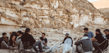 group of friends in a circle chatting